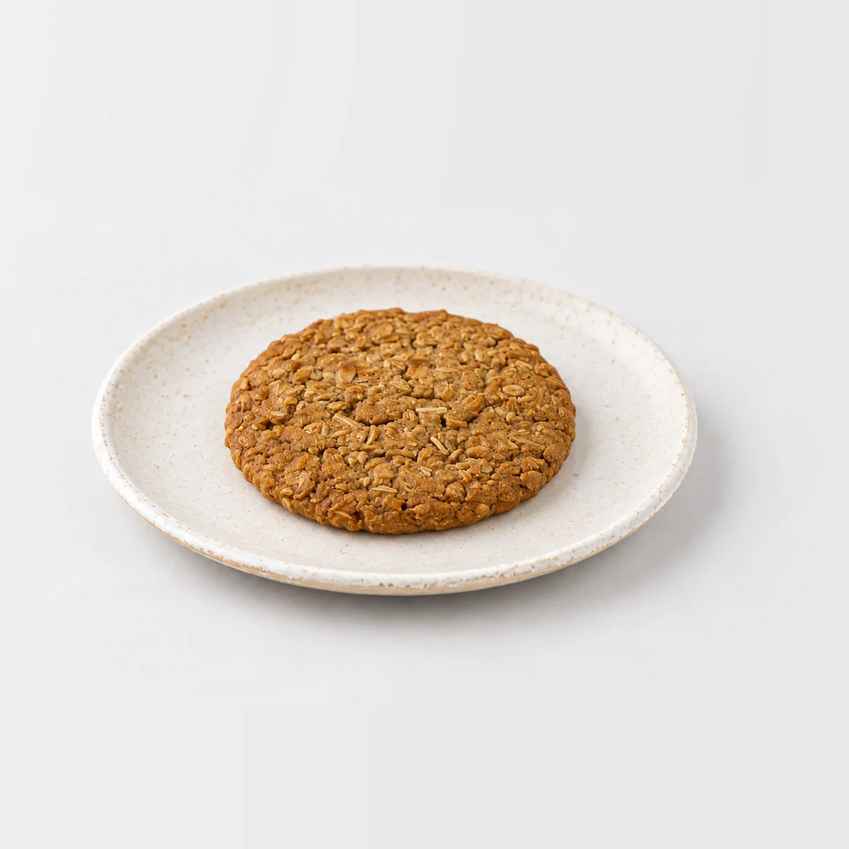 Anzac Biscuit, whole on a plate