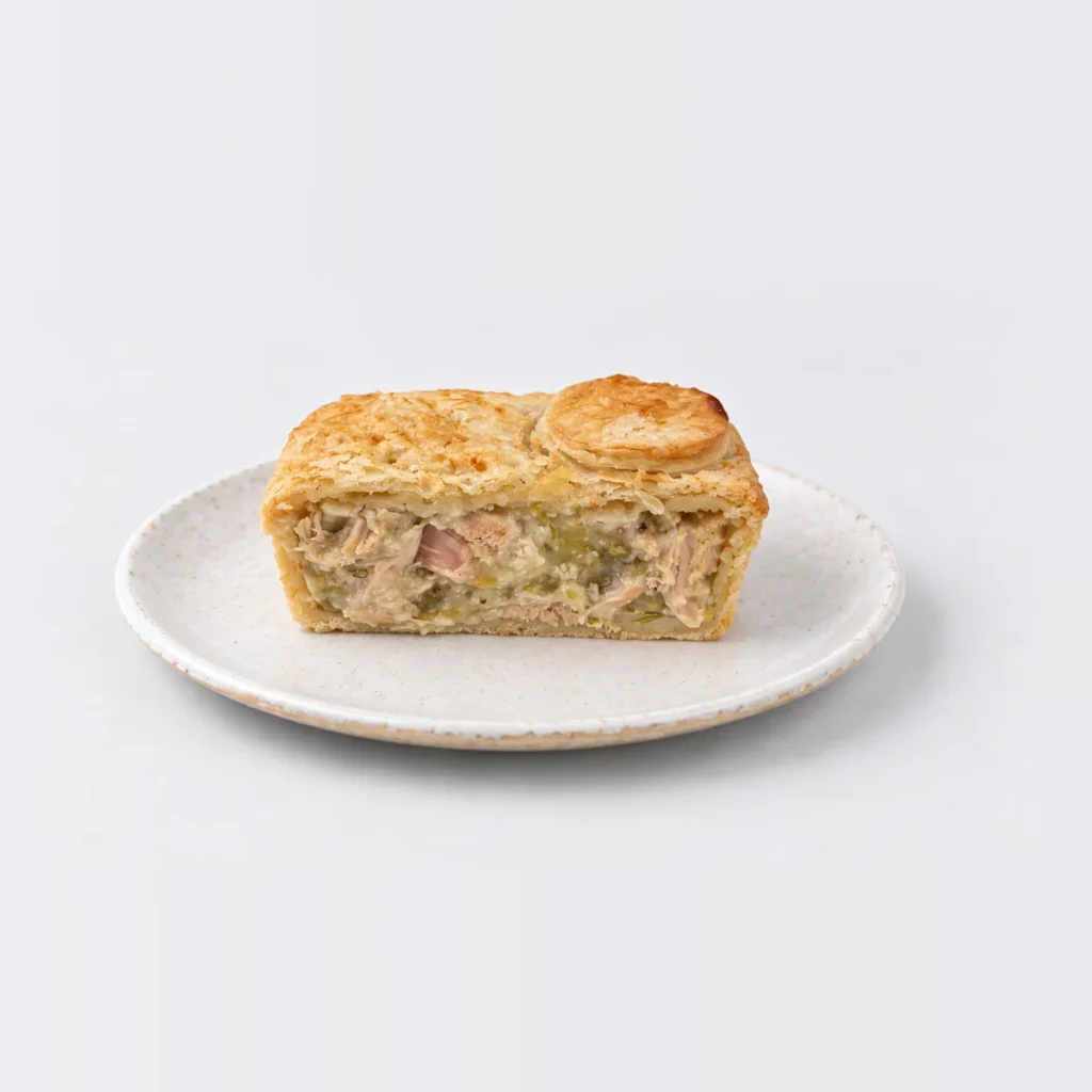 Chicken & Leek Pie, cut in half