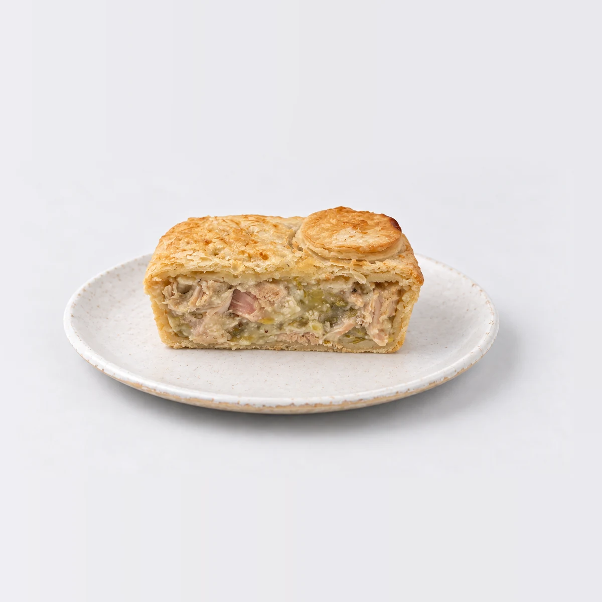 Chicken & Leek Pie, cut in half