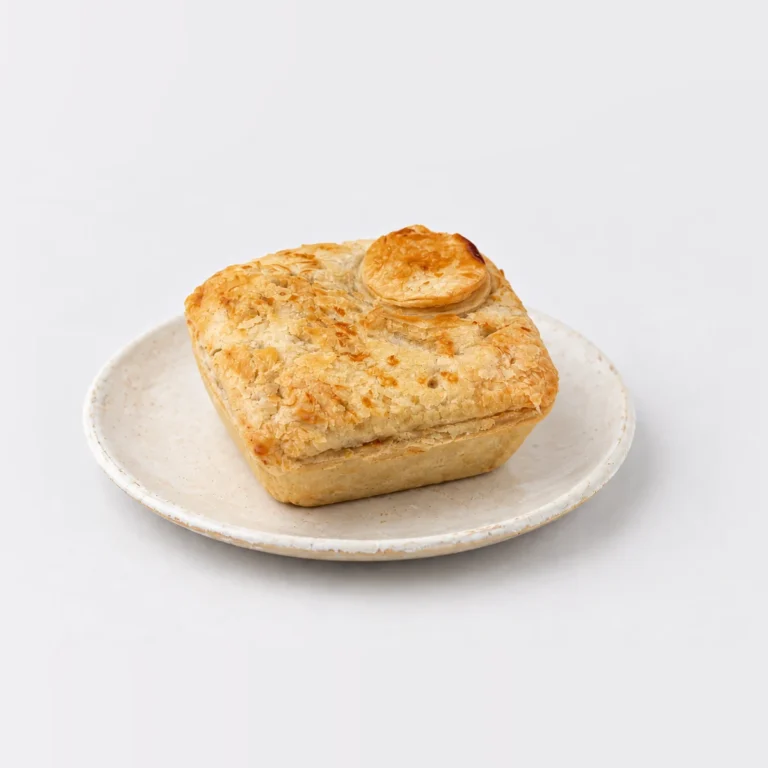 Chicken & Leek Pie, whole on a plate