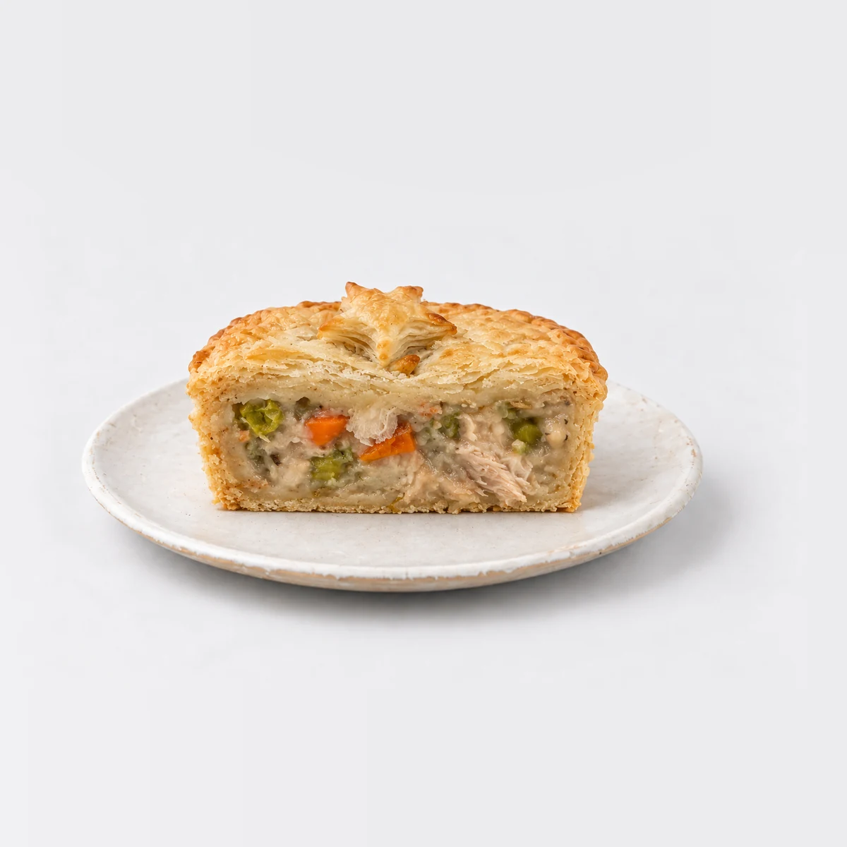 Chicken and Vegetable Pie, cut in half