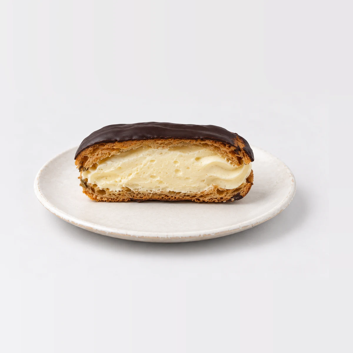 Chocolate Eclair, cut in half