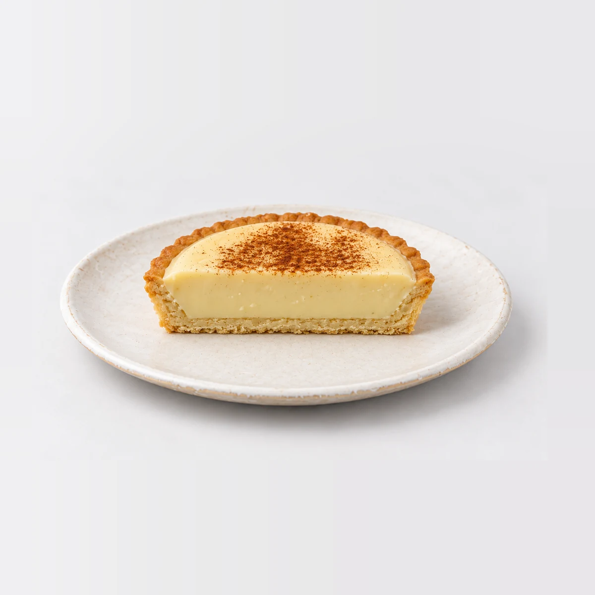 Custard Tart, cut in half