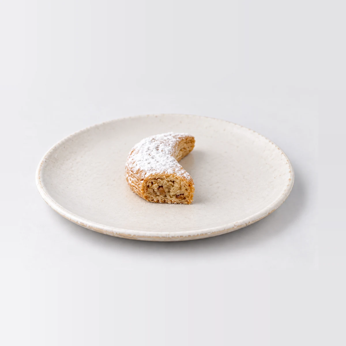 Kourabiedes, cut in half