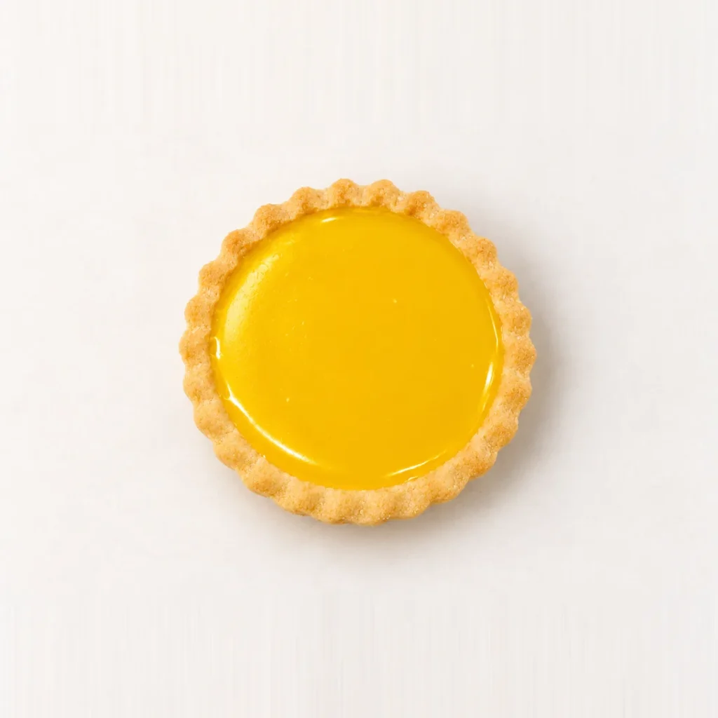 Individual yellow jam tart