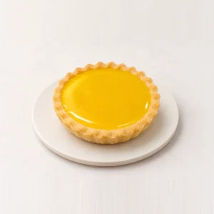 Individual yellow jam tart