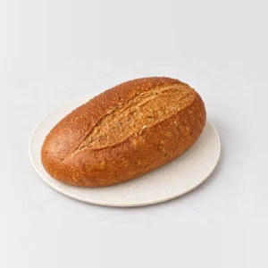 Multigrain Loaf, whole on a plate