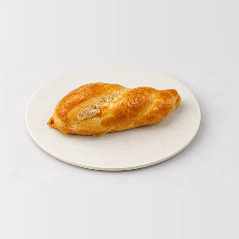 Plait Roll White, whole on a plate