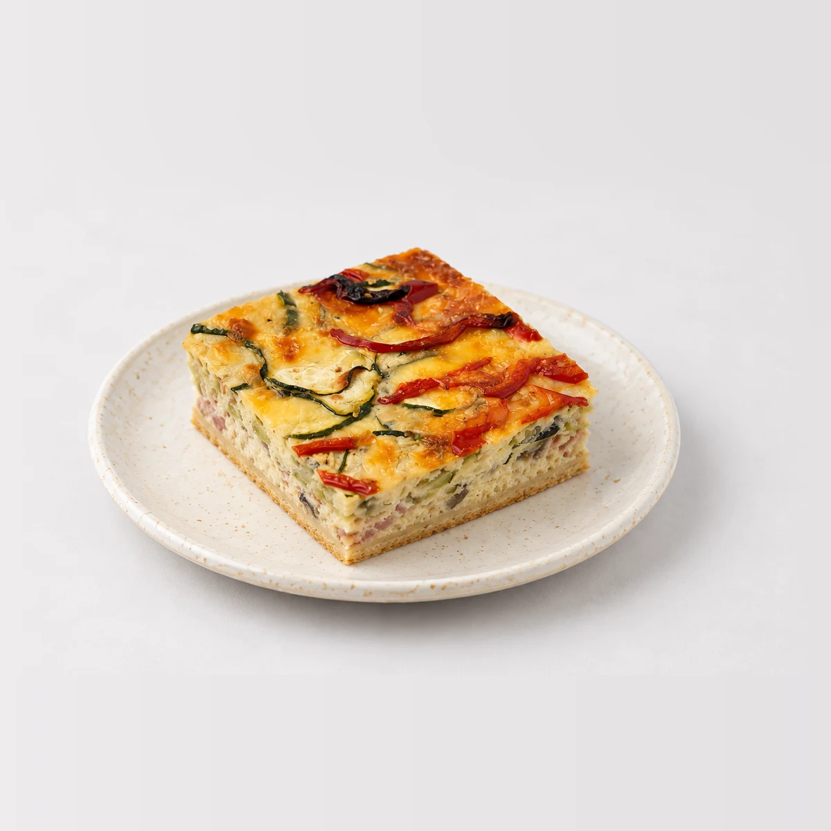 Quiche Lorraine, whole on a plate