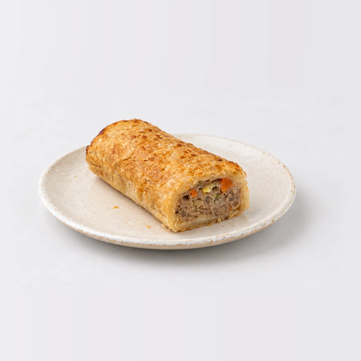 Sausage Roll, whole on a plate