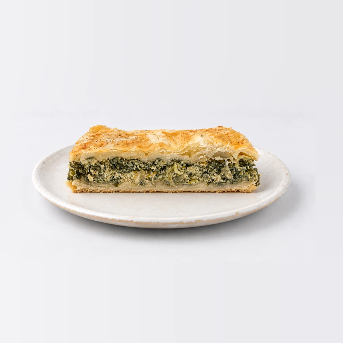 Spanakopita, cut in half