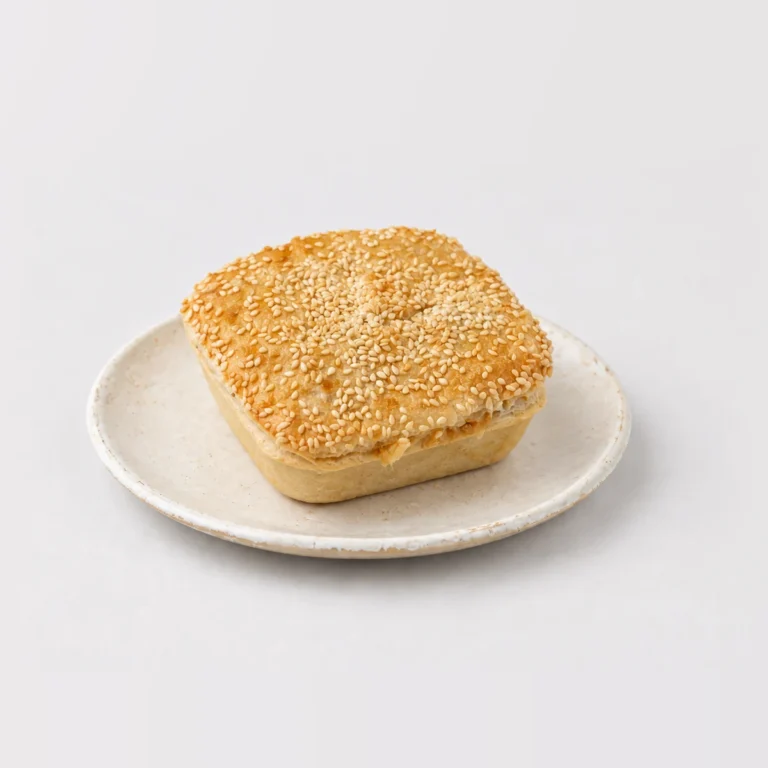 Steak and Cheese Pie, whole on a plate