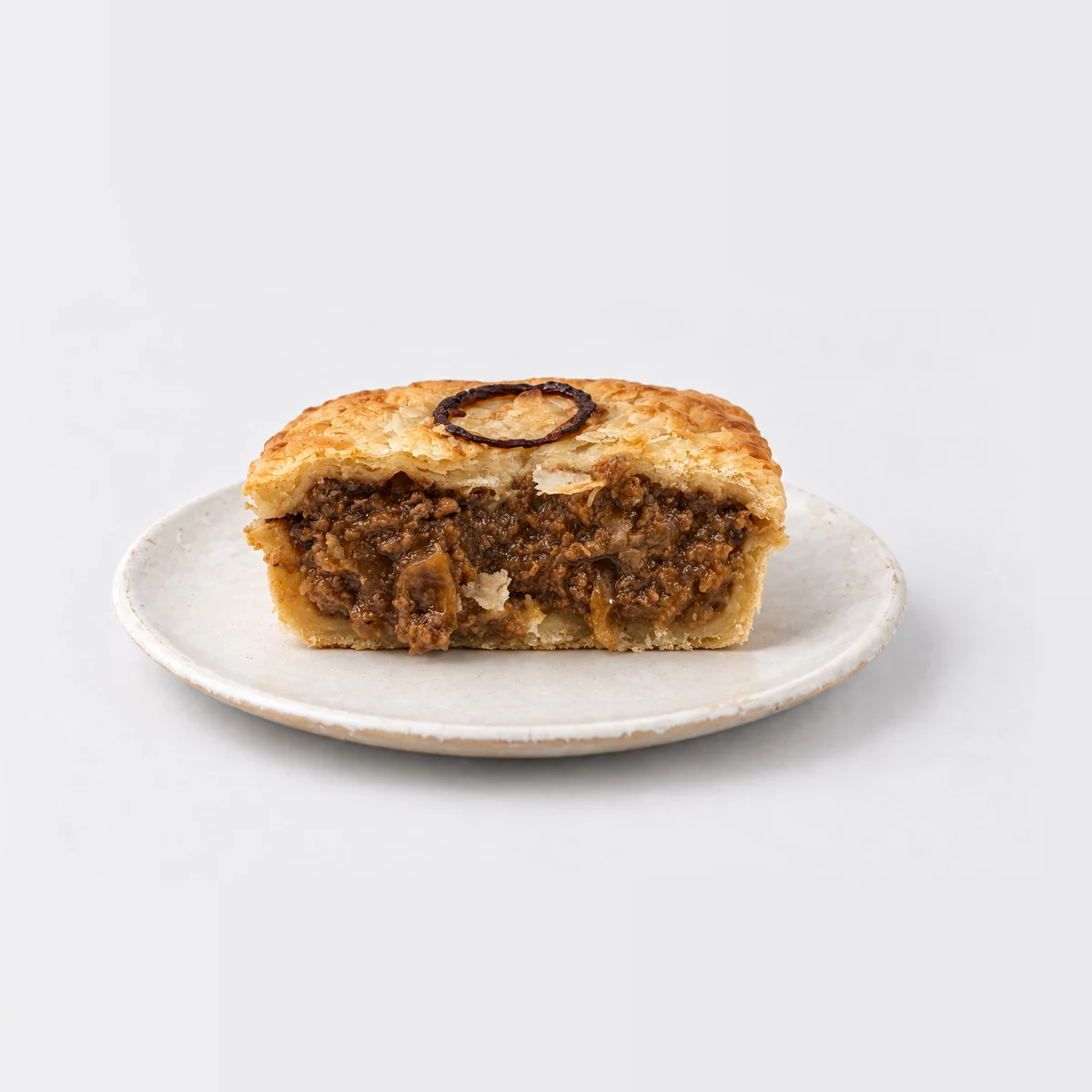 Steak and Onion Pie, cut in half