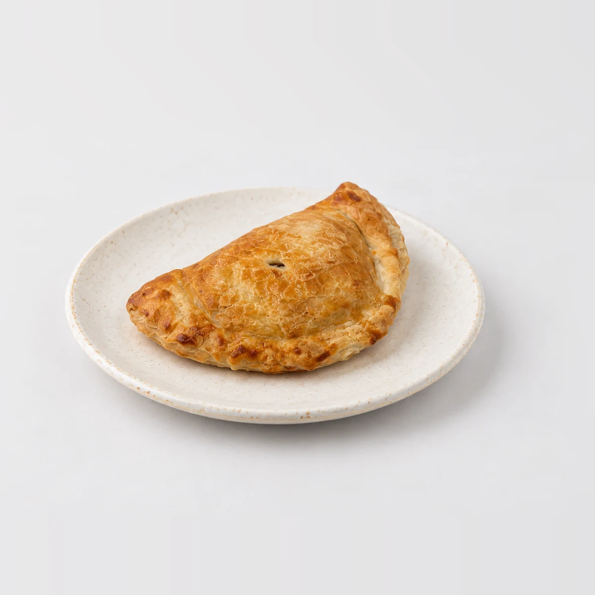 Vegetable Pastie, whole on a plate