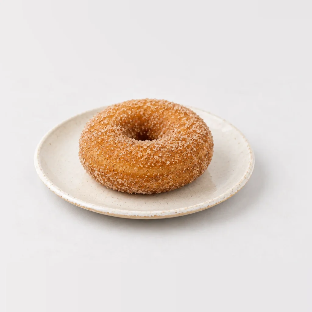 Cinnamon Donut, whole on a plate