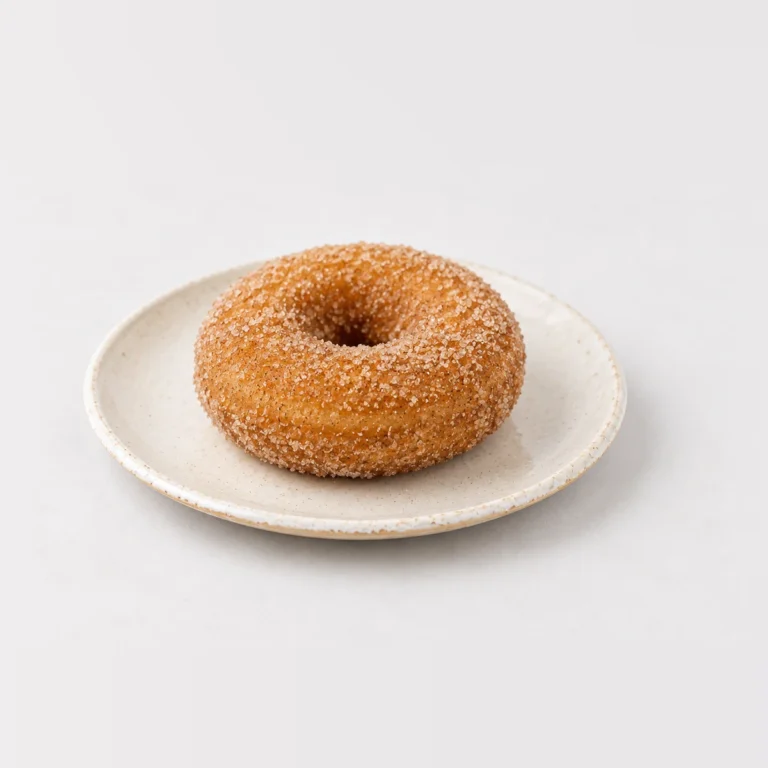 Cinnamon Donut, whole on a plate