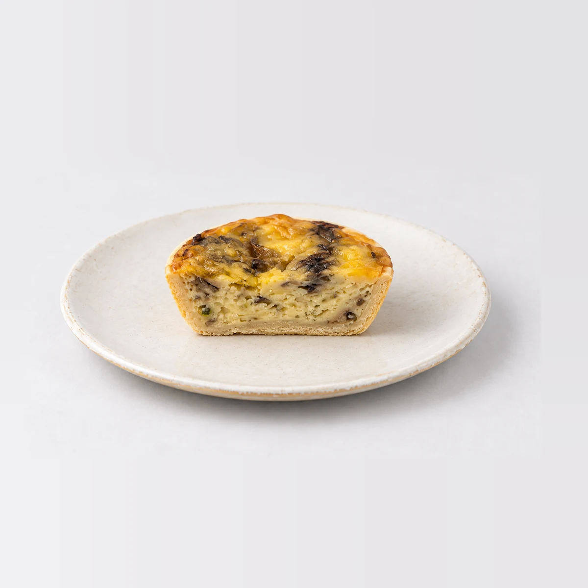 Party Egg, Mushroom & Cheese Quiche (Large - 40pc), cut in half