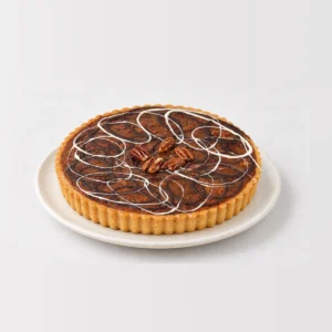 Pecan Tart, whole on a plate