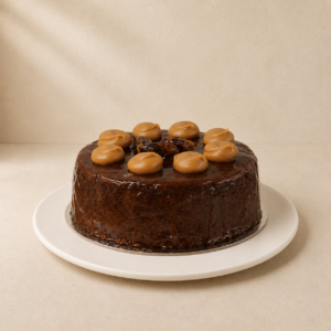 Sticky date pudding glazed in butterscotch toffee sauce and topped with caramel.