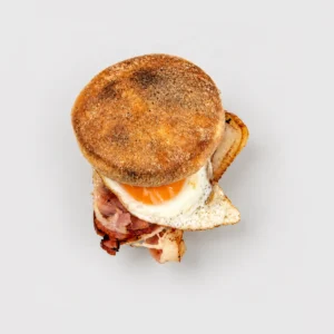 Egg and bacon breakfast roll / muffin — Top-down